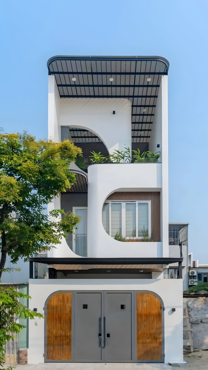 Mẫu nhà 2 tầng 1 tum sau khi xây dựng hoàn thiện